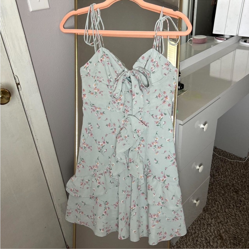 cider blue and pink floral dress with ruffles, bow tie straps, & front bow/knot